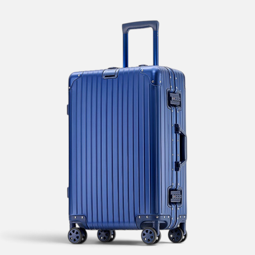 Valise MoovNext AURA en aluminium et magnésium bleu avec design rainuré, poignée télescopique et quatre roues
