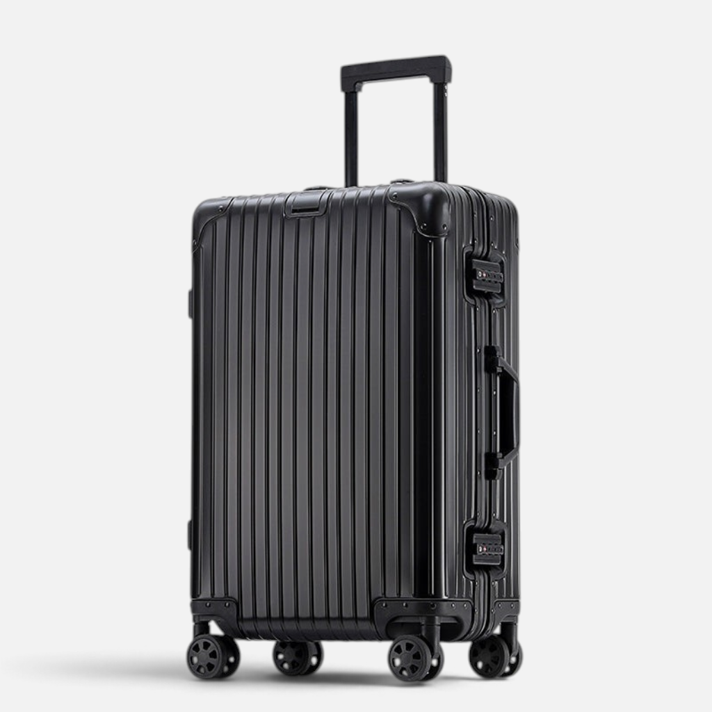 Valise MoovNext AURA noire en aluminium et magnésium avec design rainuré et roulettes multidirectionnelles