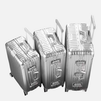 Set de trois valises MoovNext AURA en aluminium argenté avec structure renforcée et serrures TSA